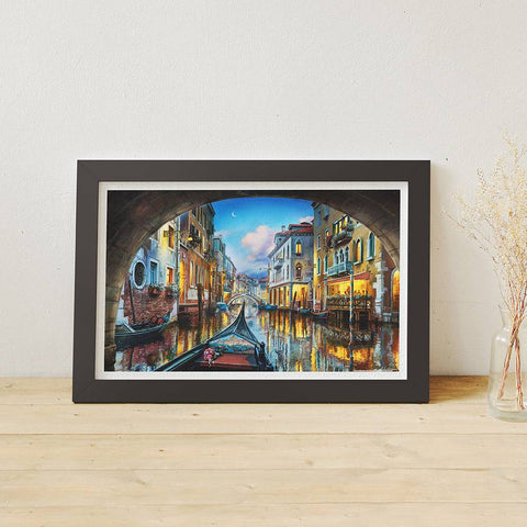 Framed jigsaw puzzle of Venetian canal scene on display.