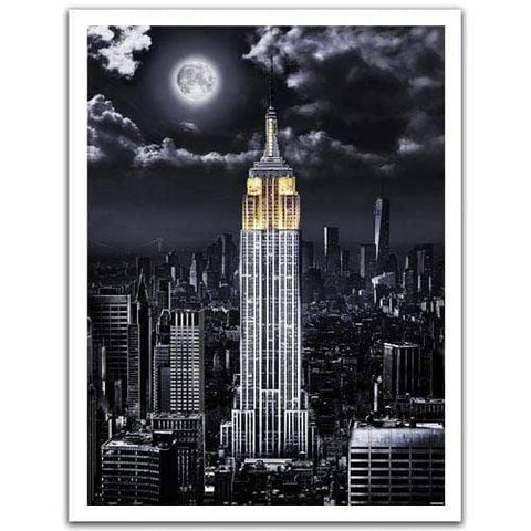 Empire State Building puzzle completed, moonlit skyline.