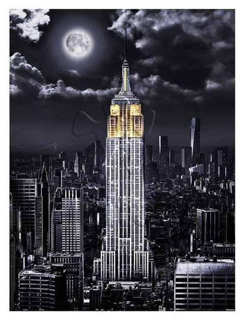 Empire State Building puzzle, night scene with full moon.