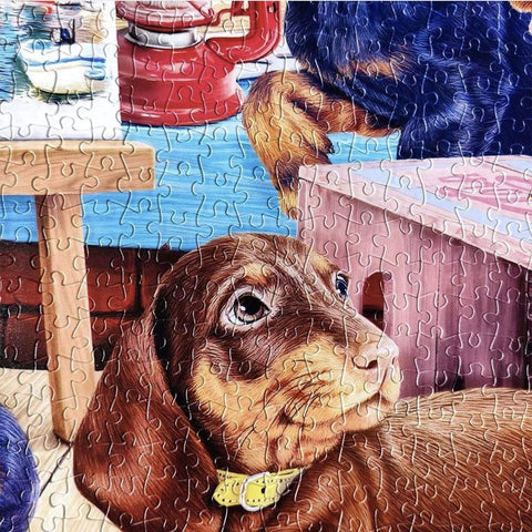 Detailed view of a puppy on the jigsaw puzzle.